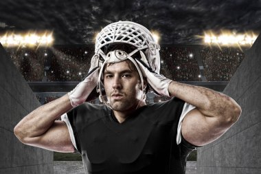 Futbolcu siyah üniforma ile