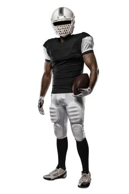 Futbolcu siyah üniforma ile