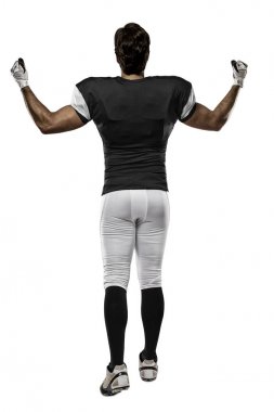 Futbolcu siyah üniforma ile