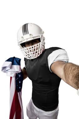 Futbolcu siyah üniforma ile