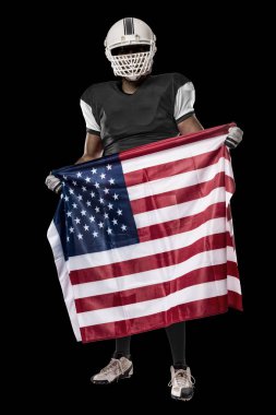 Futbolcu siyah üniforma ile