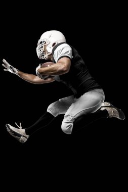 Futbolcu siyah üniforma ile