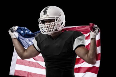 Futbolcu siyah üniforma ile