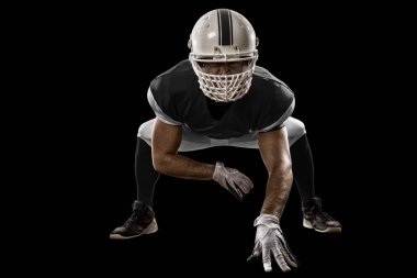 Futbolcu siyah üniforma ile