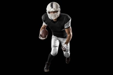 Futbolcu siyah üniforma ile