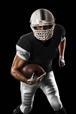 Futbolcu siyah üniforma ile