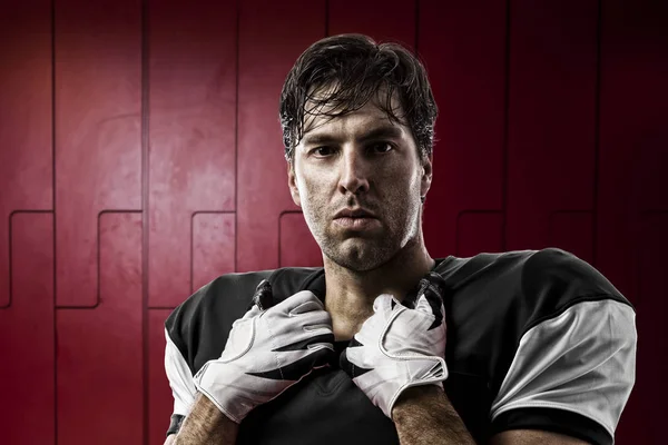 Jugador de fútbol con uniforme negro —  Fotos de Stock