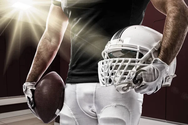 Voetballer met een zwart uniform — Stockfoto