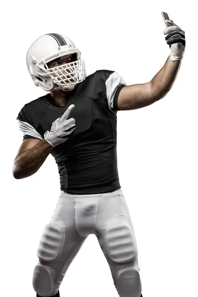 Football Player with a Black uniform — Stock Photo, Image