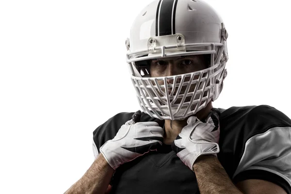 Jogador de futebol com um uniforme preto — Fotografia de Stock