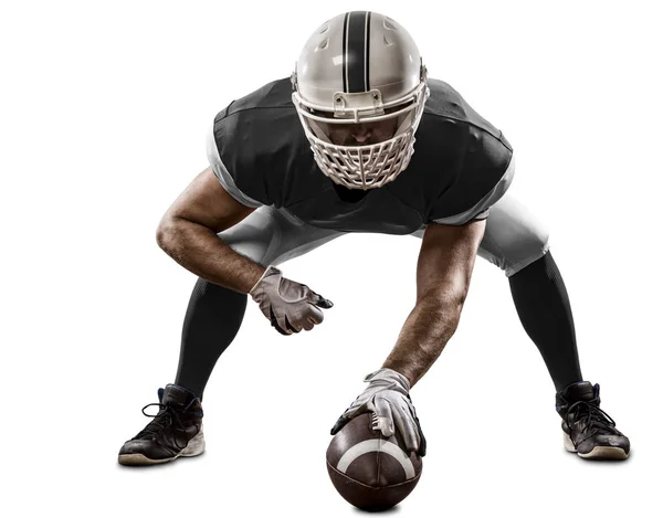 Jogador de futebol com um uniforme preto — Fotografia de Stock