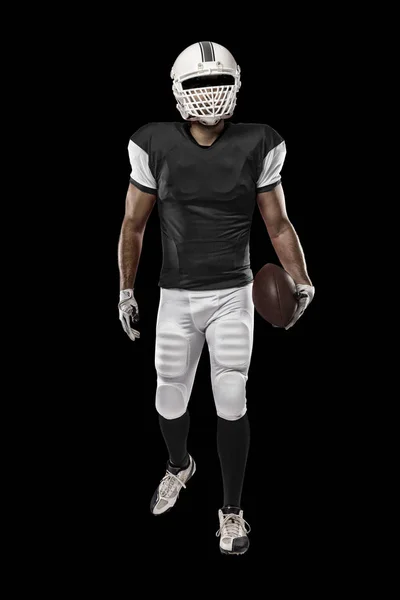 Jugador de fútbol con uniforme negro — Foto de Stock