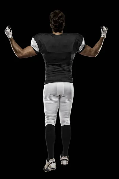 足球运动员穿的黑色制服， — 图库照片