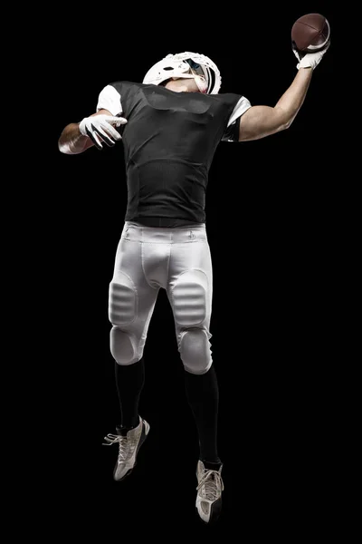 Football Player with a Black uniform — Stock Photo, Image