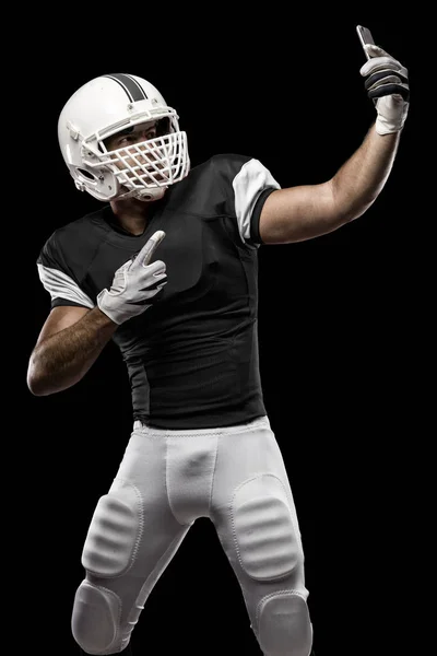 Football Player with a Black uniform — Stock Photo, Image