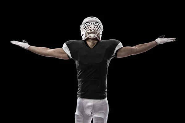 Jogador de futebol com um uniforme preto — Fotografia de Stock