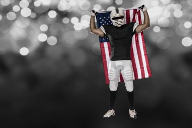 Futbolcu siyah üniforma ile