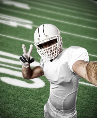 Beyaz üniforma futbolcu