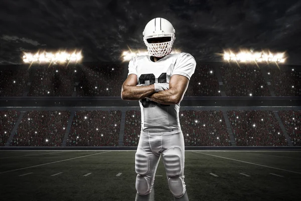 Jogador de futebol com um uniforme branco — Fotografia de Stock