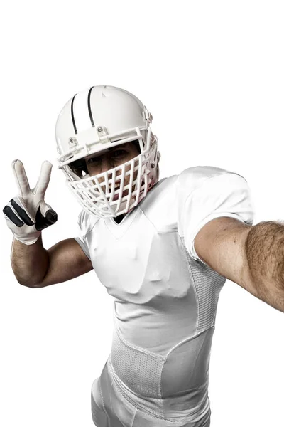 Jogador de futebol com um uniforme branco — Fotografia de Stock