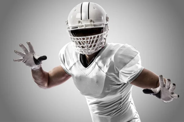 Jogador de futebol com um uniforme branco — Fotografia de Stock