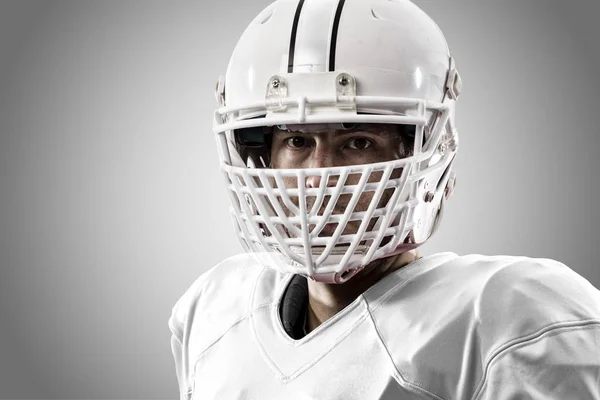 Jogador de futebol com um uniforme branco — Fotografia de Stock