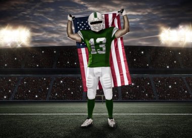 Futbolcu yeşil üniforma ile