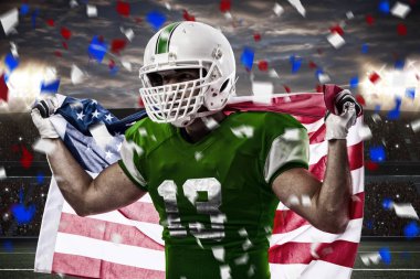 Futbolcu yeşil üniforma ile