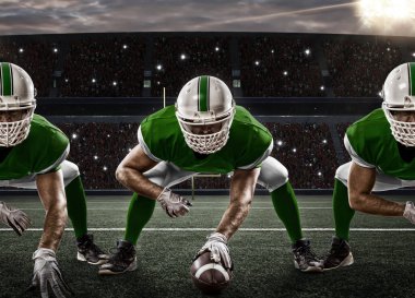 Futbolcu yeşil üniforma ile