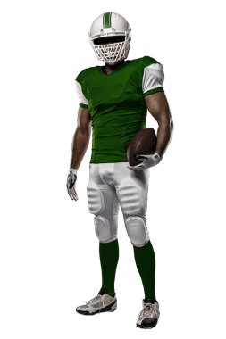 Futbolcu yeşil üniforma ile