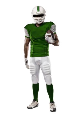 Futbolcu yeşil üniforma ile