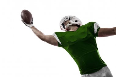 Futbolcu yeşil üniforma ile