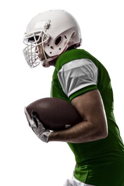 Futbolcu yeşil üniforma ile