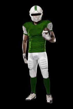 Futbolcu yeşil üniforma ile