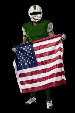 Futbolcu yeşil üniforma ile