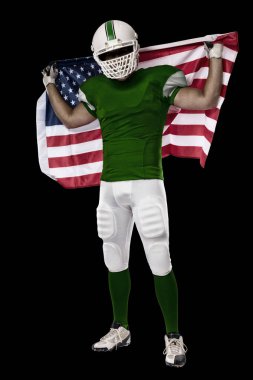 Futbolcu yeşil üniforma ile