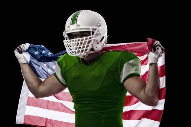 Futbolcu yeşil üniforma ile