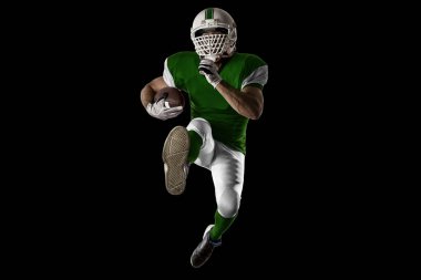 Futbolcu yeşil üniforma ile