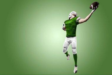 Futbolcu yeşil üniforma ile