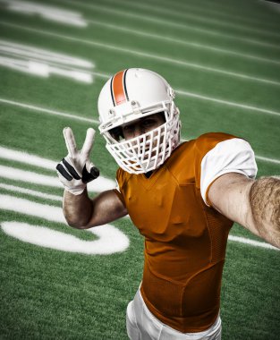 Futbolcu turuncu üniforması