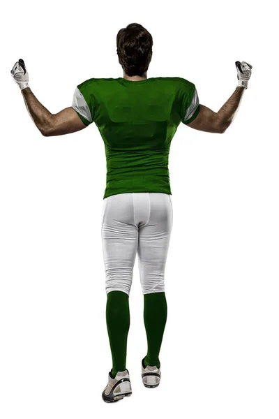 Football Player with a green uniform — Stock Photo, Image