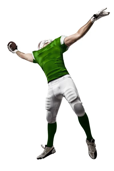 Joueur de football avec un uniforme vert — Photo