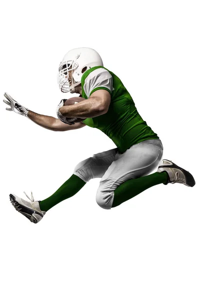 Fußballspieler mit grüner Uniform — Stockfoto