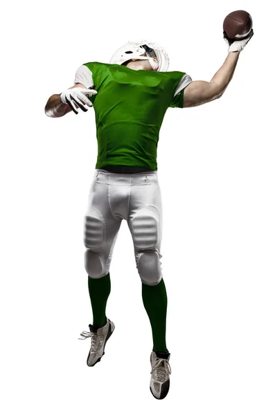 Football Player with a green uniform — Stock Photo, Image