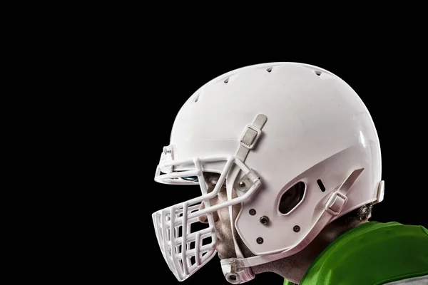 Football Player with a green uniform — Stock Photo, Image