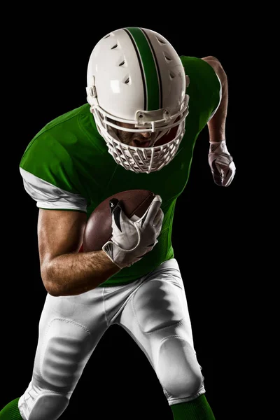 Football Player with a green uniform — Stock Photo, Image