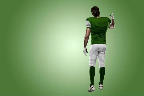 Jugador de fútbol con uniforme verde — Foto de Stock