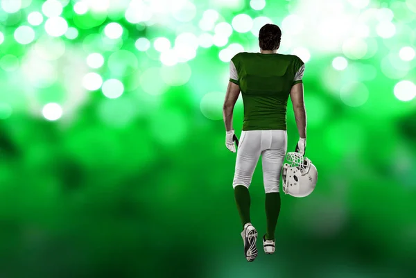 Football Player with a green uniform