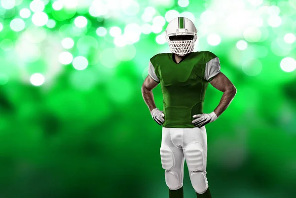 Fußballspieler mit grüner Uniform — Stockfoto