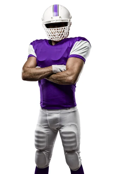 Fotbalista s fialovou uniformu — Stock fotografie